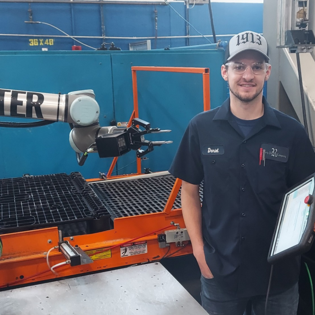 Intern RPC photo of worker with machinery